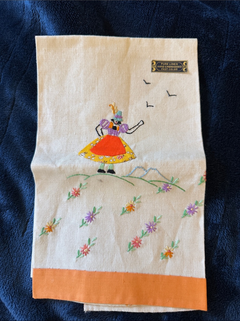 Embroidered Linen Hand Towel with Orange Border and Multicolor Motif